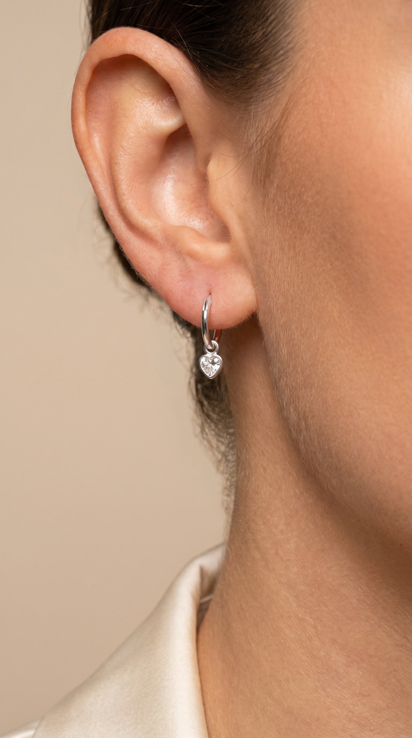 Silver Earrings with a Hanging Heart